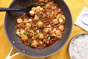 Simply-Recipes-Mapo-Tofu-LEAD-01-5103ca738c354aa295c63af57b809bfd.jpg